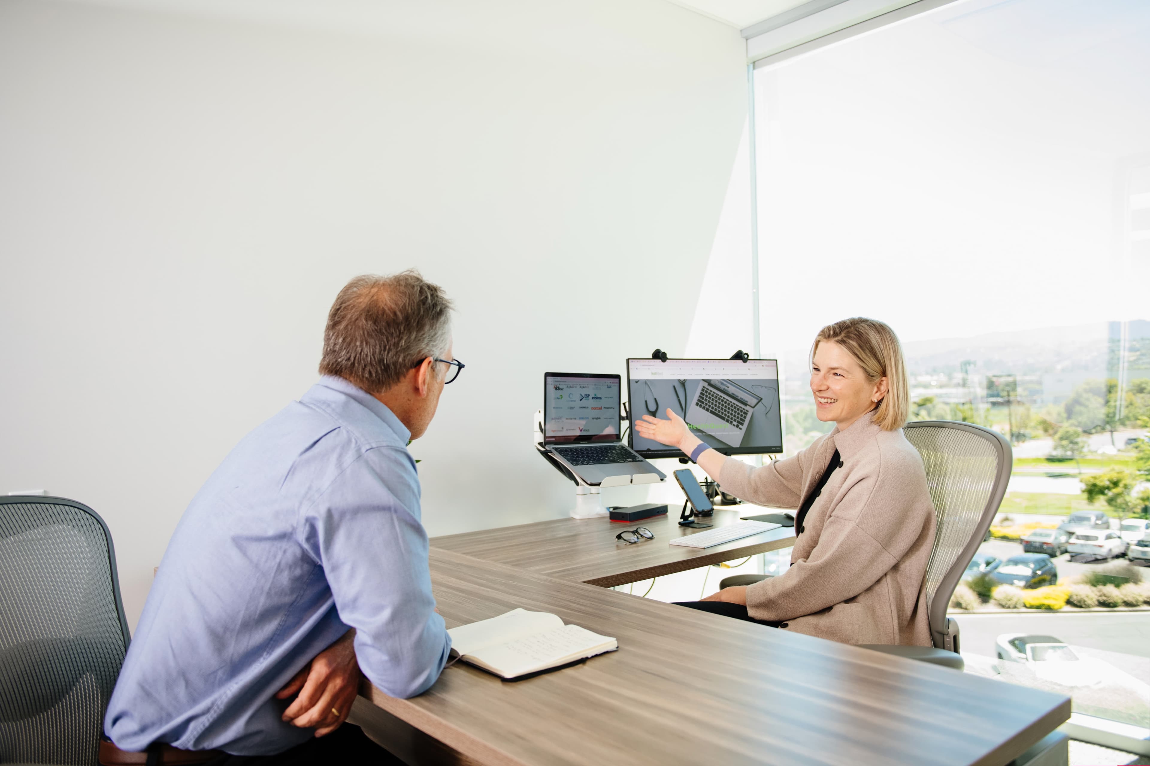 two people at a desk